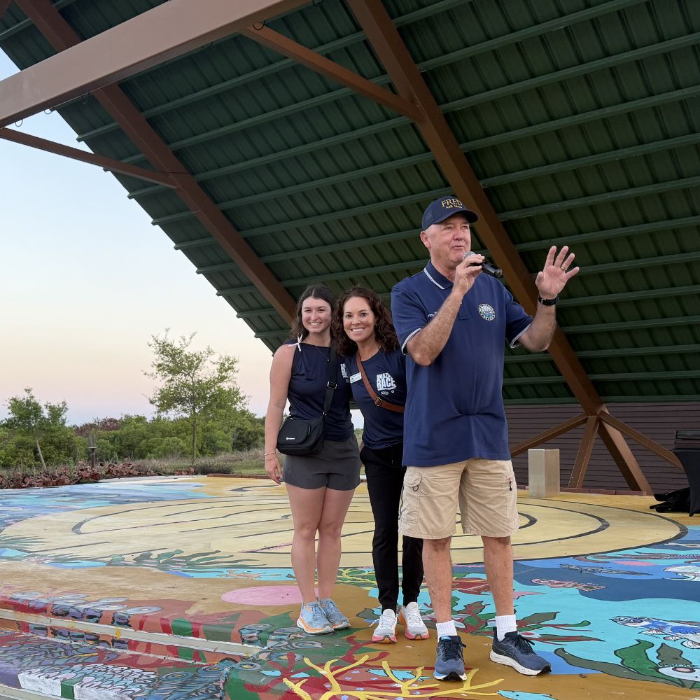 Fred Cleveland with Emily and Stephanie at the Amazing Race event