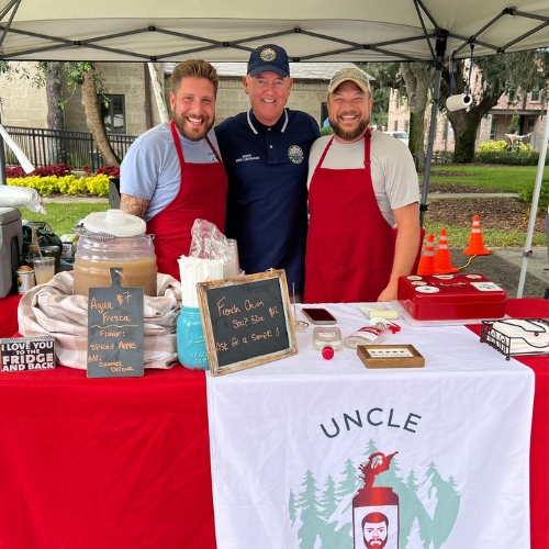 Fred Cleveland with Uncle Chris at NSB Farmers Market